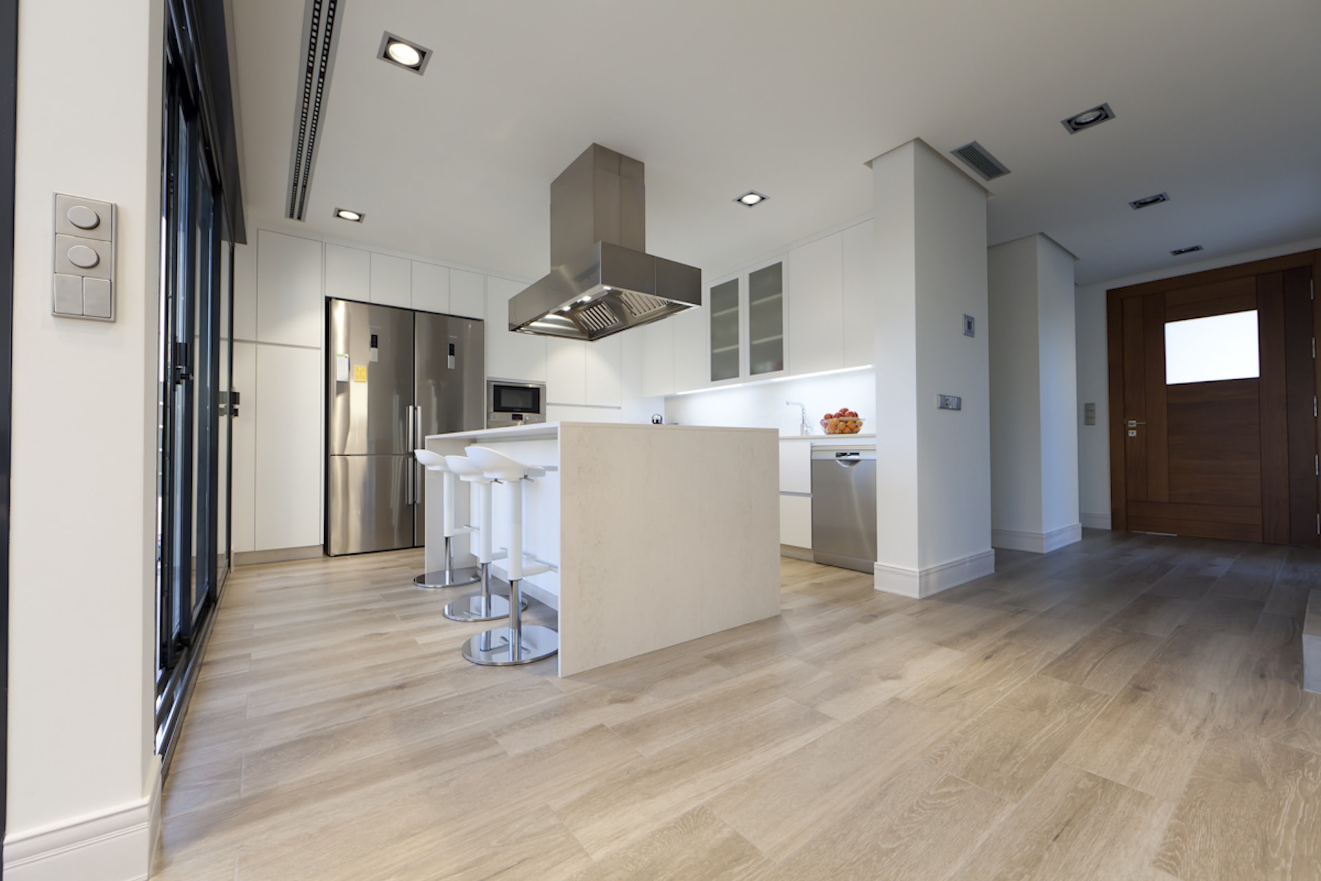 modern kitchen white with inox details